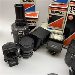 Minolta X700 camera body and Minolta XGM camera body, Tamron 'SP 60-300mm f3.8-5.4' lens, Tamron 'SP 35-80mm f2.8-3.8' lens', Tamron 'SP 500mm 1:8' CF tele macro catadioptric lens and various accessories including filters, tele-converter, flash etc