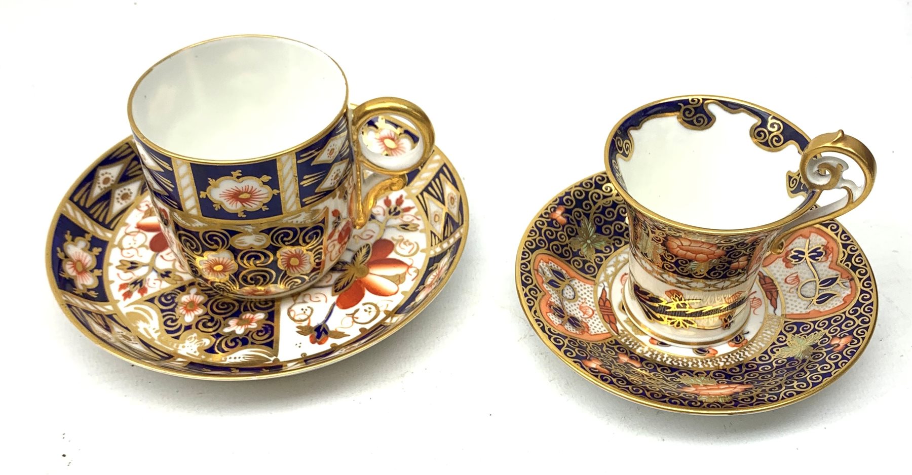 Two Royal Crown Derby Imari pattern tea cups and saucers, the first