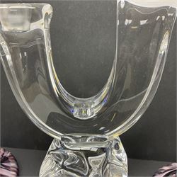 Daum glass two stemmed candle stick signed to verso, together with a pair of slag glass purple candle sticks, Daum H21cm