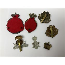 Over thirty regimental cap badges for fusiliers, Yorkshire interest, Light Infantry etc including Royal Scots and Welsh fusiliers, Durham L.I., KO Yorkshire L.I., Oxford & Bucks L.I., Green Howards, East Yorkshire, West Riding, York North Riding etc 