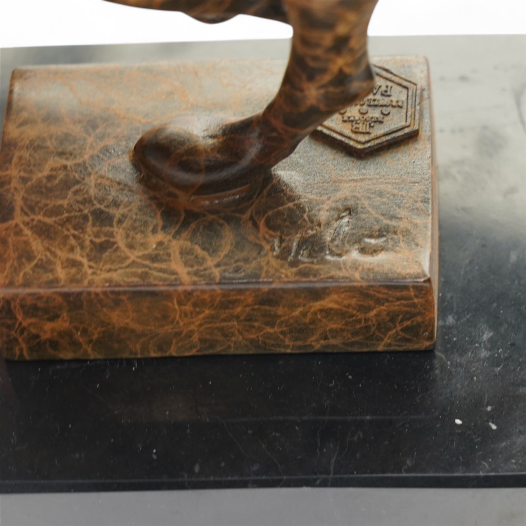 After Milo - Bronze two toned figure of running cheetah, upon a rectangular marble base, signed and with foundry mark, H20cm