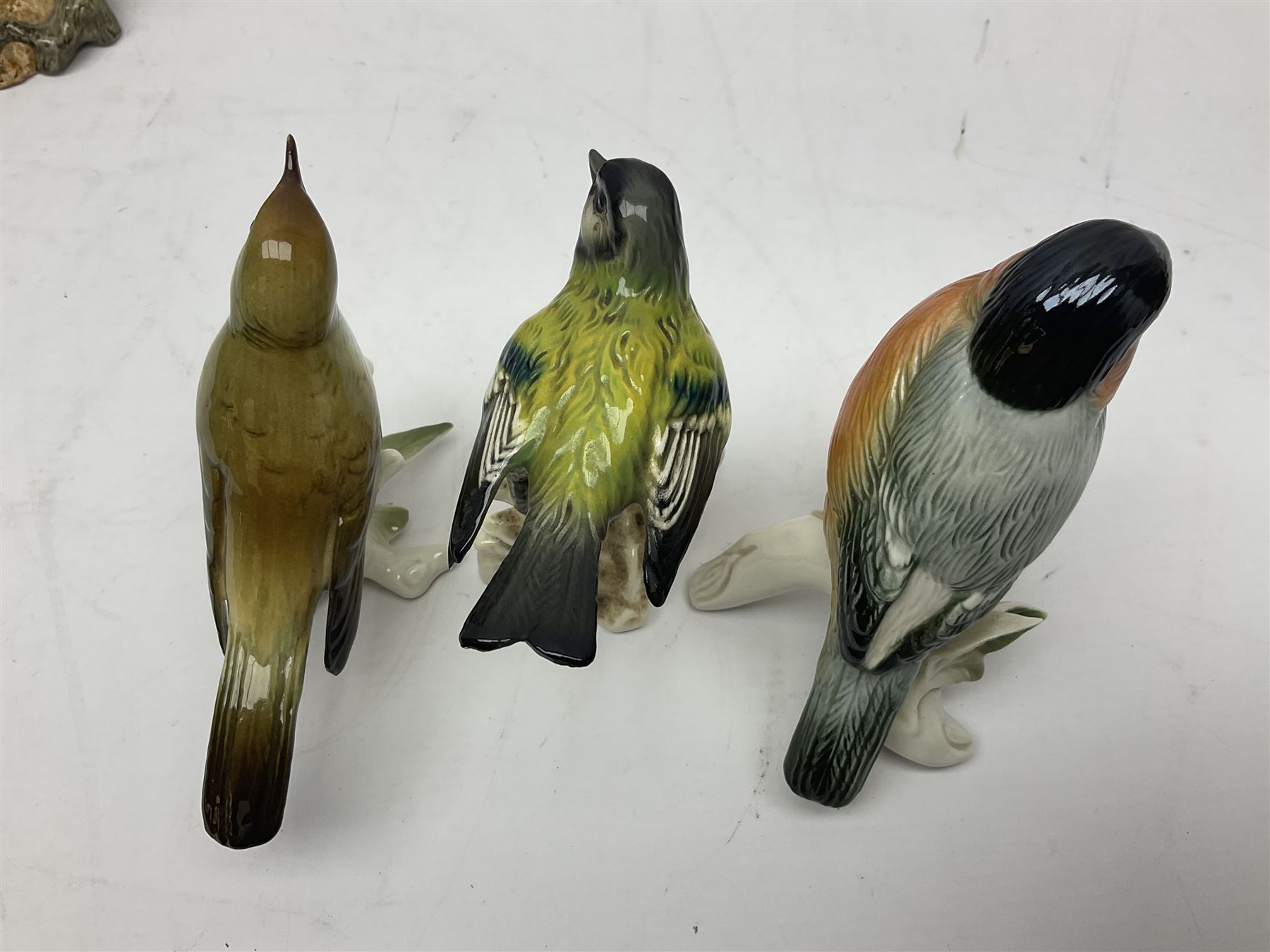 Eight Karl Ens bird figures, together with Mack blue tit and one other