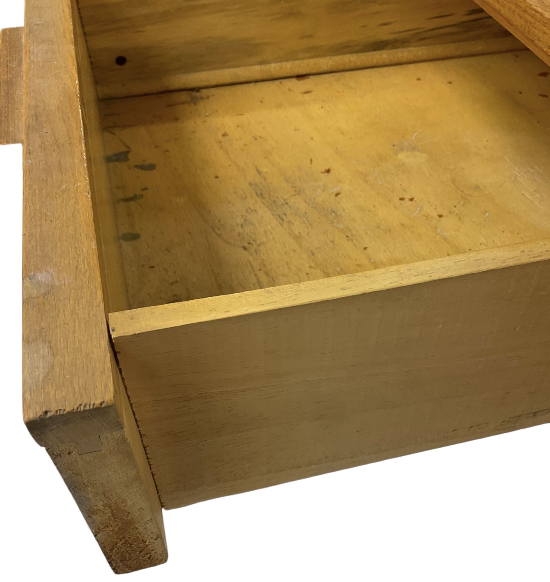 Heals of London - 1950s walnut and beech dressing table, raised triple mirror back over trinket compartments enclosed by sliding doors, above three drawers, on tapering supports