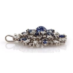 18ct white gold sapphire and diamond pendant, the central oval cabochon sapphire, with marquise cut sapphire and round brilliant cut diamond surround