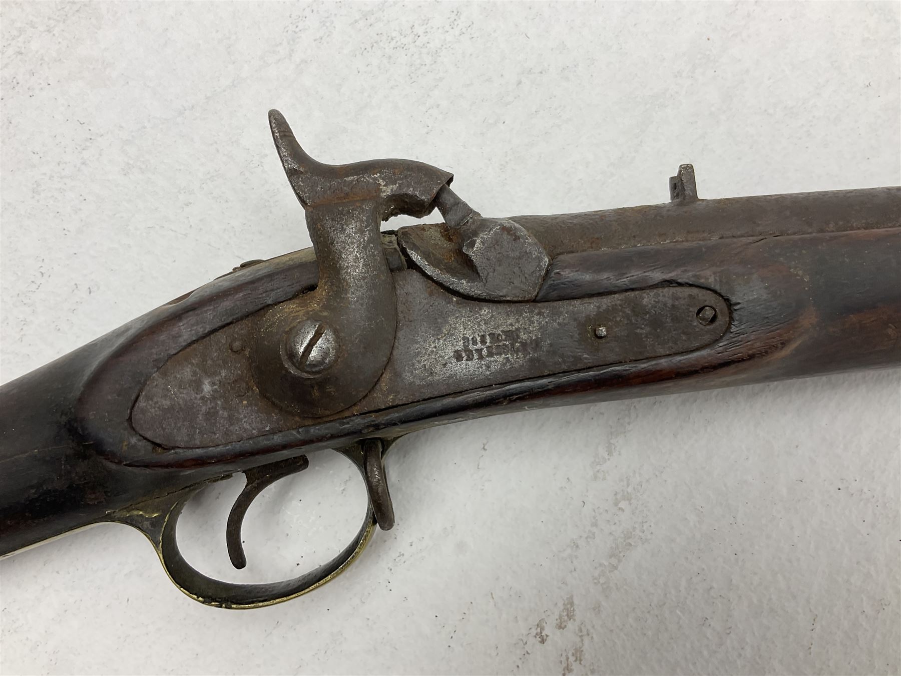 20th century Indian percussion musket, the 76cm barrel with two bands, indistinctly inscribed lock-plate, walnut full stock stamped 642 with brass butt and trigger guard and under barrel ramrod channel L121cm overall