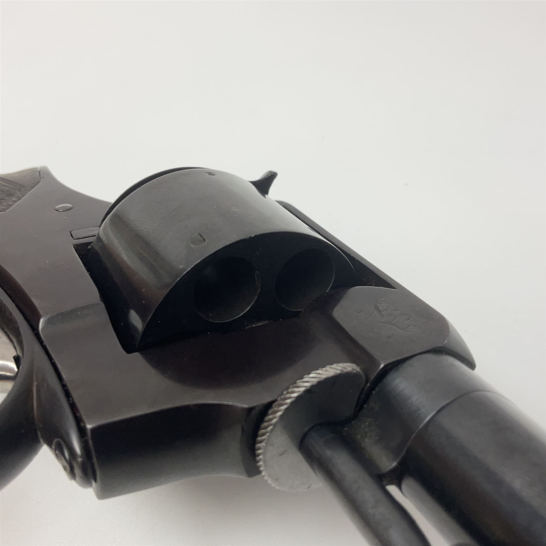 Scarce Webley & Scott .430 short six-shot revolver retailed by S.W. Silver & Co of Cornhill, London; round barrel with captive swivel ejector under; chequered walnut one-piece grip; numbered 12627 with various maker's marks L26cm overall; in fitted oak case with trade label to lid, cleaning rod, screw-driver and oil bottle
