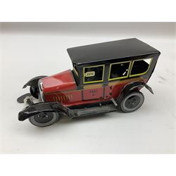 Six modern clockwork tin-plate toys comprising table tennis players by P.P L23cm; hotel porter; vintage car; two aircraft and zeppelin; all unboxed (6)