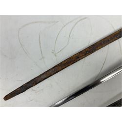 George V British Army 1897 pattern officers sword with plain 82cm fullered steel blade, pierced  basket hilt with George V cypher and wire bound leather grip with chequered backstrap; in leather covered field service scabbard L101cm overall; and another officer's sword in relic condition lacking scabbard (2)