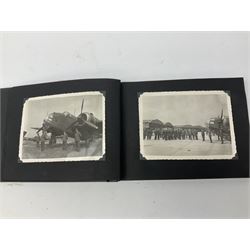 144 Squadron RAF - album containing over one hundred photographs and postcards of varying sizes including group shots, aircraft on the ground and in the air, German aircraft, crashes etc; sizes from 3.5 x 6cm to 16 x 21cm; and quantity of modern reference material
