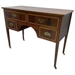 Georgian design inlaid mahogany kneehole desk or side table, rectangular top with satinwood banding, fitted with two long over two short drawers, raised on square tapering supports with brass castors