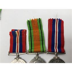 Twelve WW2 medals comprising four 1939-1945 war medals, four Defence medals, three 1939-1945 Stars and Africa Star; all with ribbons; some as groups in two issue boxes with slips