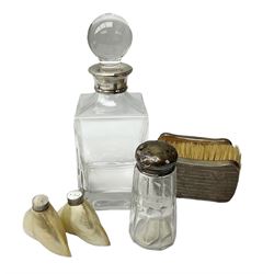 Two engine turned silver brushes and clear glass decanter with silver collar, all stamped Birmingham, clear glass shaker with hallmarked silver top, and two mother of pearl salt and pepper shakers (6)
