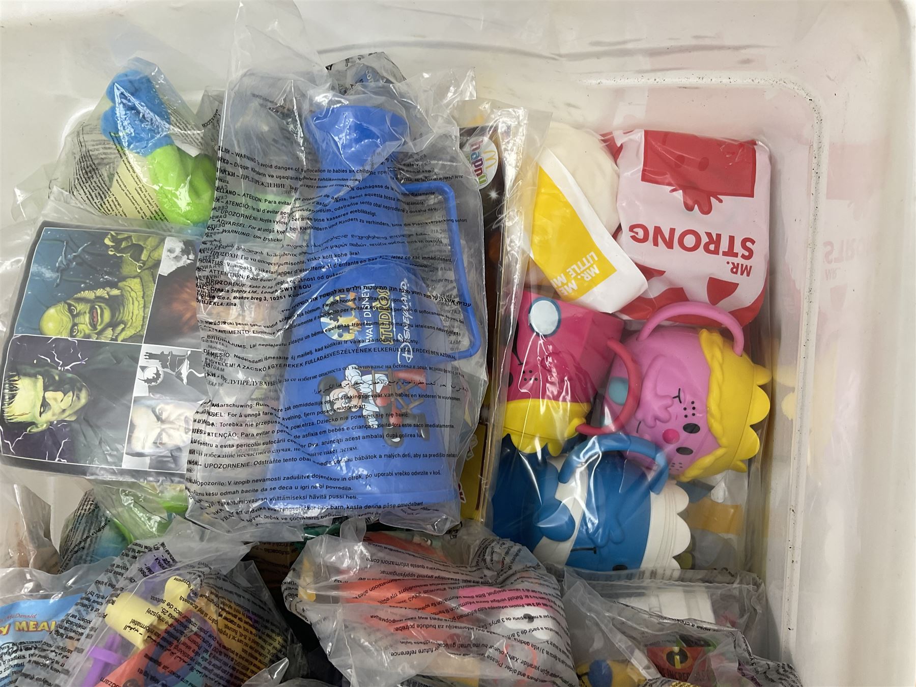 Quantity of Sunny Jim advertising soft toys, together with a quantity of Mcdonalds toys in two boxes