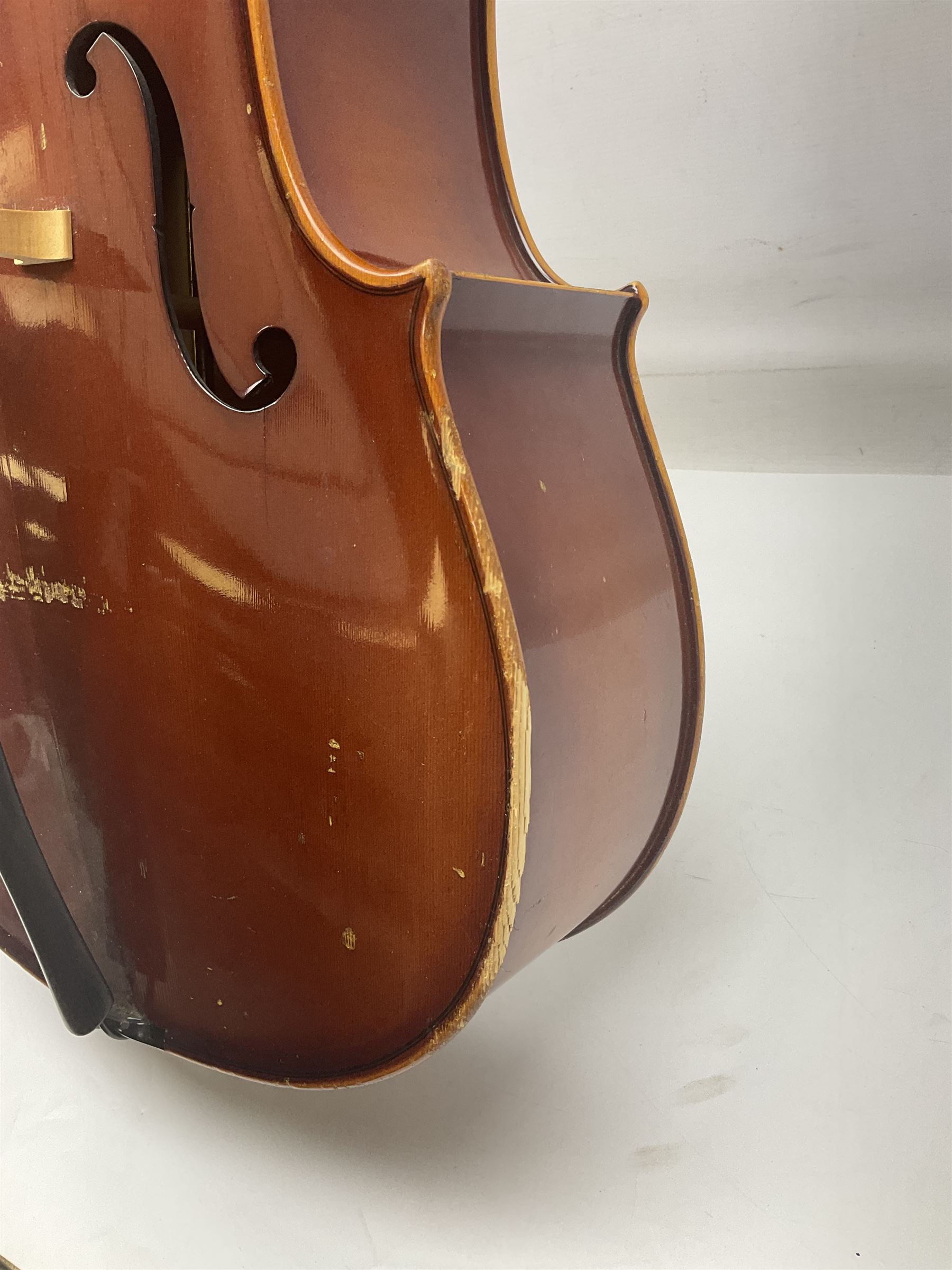 Two student half-size cellos - Boosey & Hawkes Artia with 65cm one-piece back and spruce top; bears maker's label; L104cm overall; and Romanian with 65.5cm two-piece maple back and ribs and spruce top; bears label; L108.5cm overall; each in soft carrying case with two bows (2)
