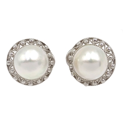  Pair of 9ct white gold mabe stud earrings, hallmarked  