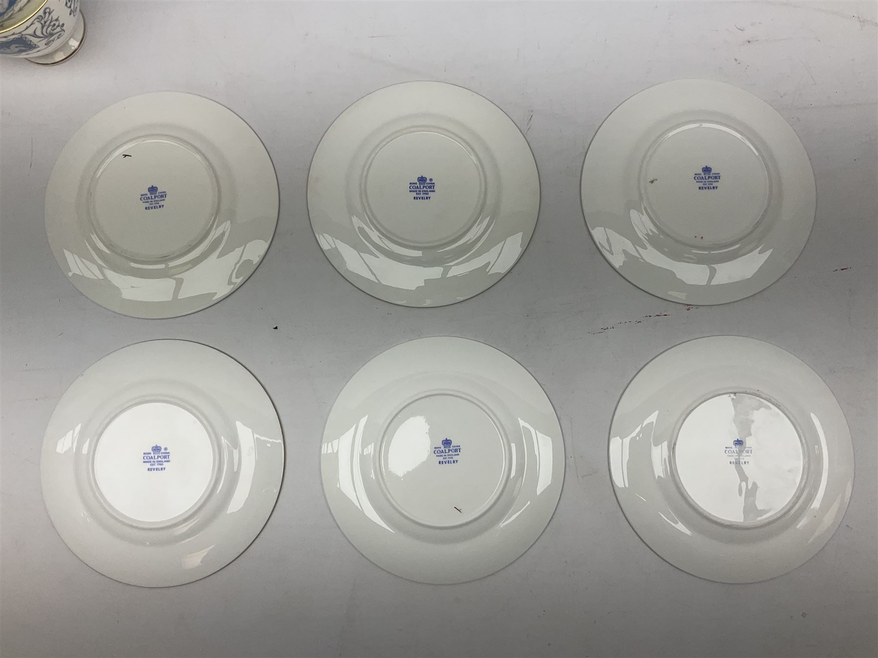 Coalport Revelry pattern tea and dinner wares, comprising nine dinner plates, four salad plates, eleven side plates, sauce boat and stand, ten teacups and ten saucers, and preserve pot and cover, together with a Coalport plate of shaped form decorated with pink roses, and a Royal Crown Derby Royal Antoinette pattern trio