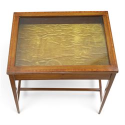 Edwardian inlaid mahogany bijouterie table of elegant proportions, rectangular hinged glazed top with mahogany banding, raised on splayed square tapering supports united by double-H stretcher