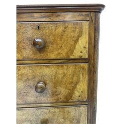 Early 20th century figured walnut chest, fitted with two short over three long drawers with bookmatch veneer facias, each with turned walnut handles, skirted base over compressed bun feet 