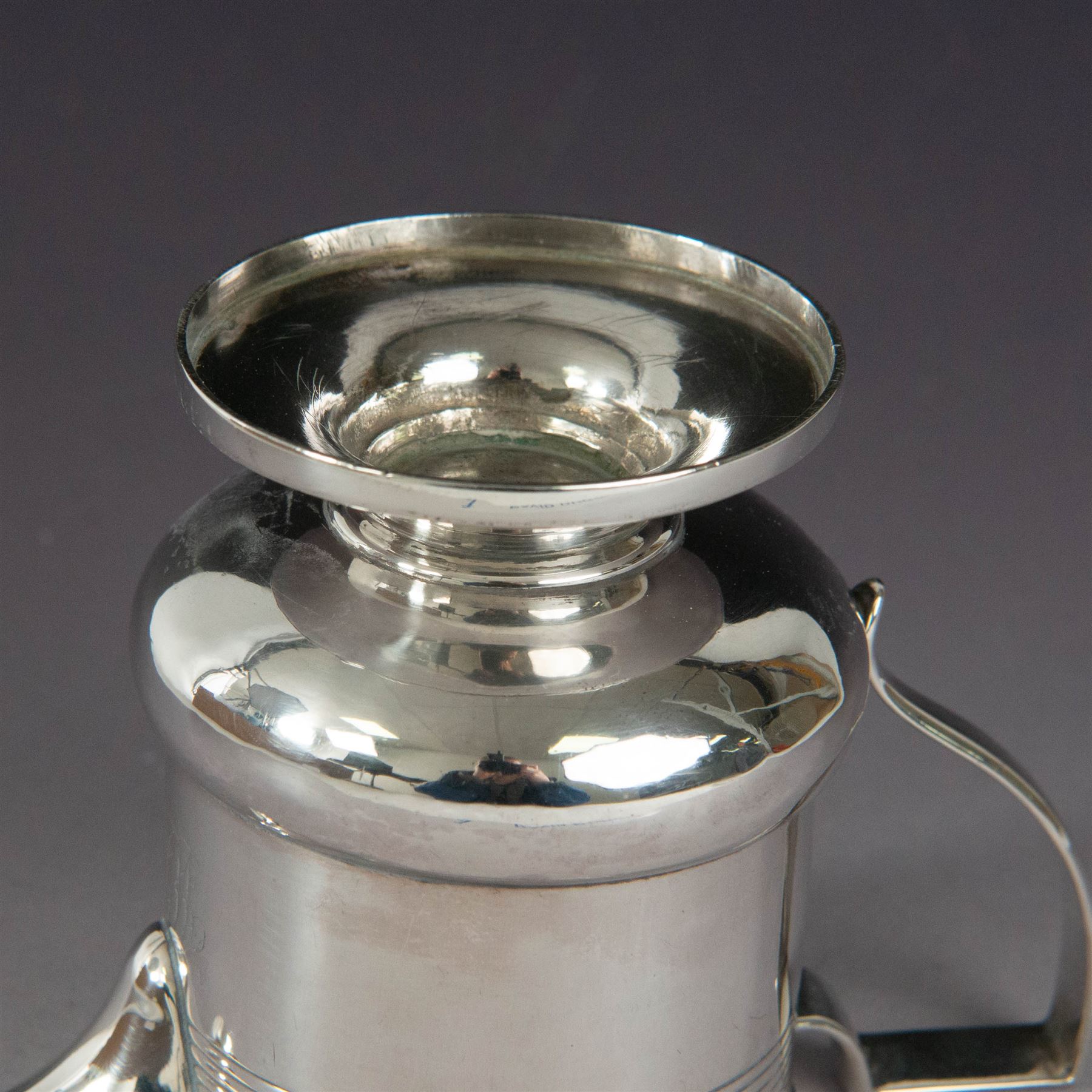 George III silver cream jug, of bellied form with ribbed decoration and angular handle, hallmarked London 1812, maker's mark worn and indistinct