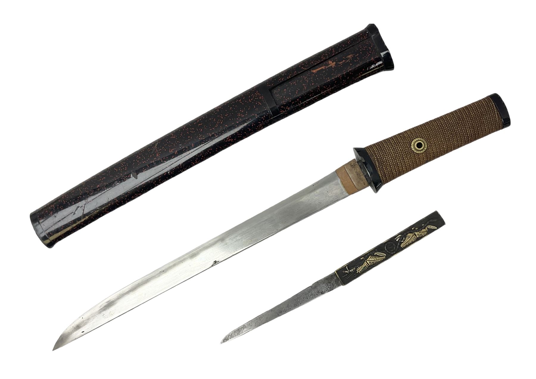 Japanese Tanto with 28.5cm steel blade and cord bound grip; in red spotted black lacquer saya containing a kogai knife with etched characters to the blade and ornate fern leaf and snake handle