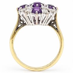 18ct gold amethyst and diamond cluster ring, five round cut amethysts, spaced by twelve round brilliant cut diamonds, London 1979, total diamonds 0.67 carat