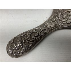 Silver mounted dressing table mirror, embossed with birds, masks, and foliate and C scrolls, hallmarked Birmingham, and fruit knife with mother of pearl handle and silver blade, (2)