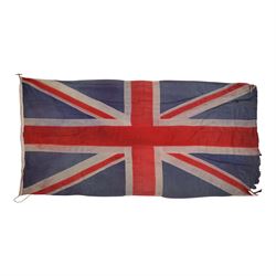 Four large linen ship's flags, including Red Ensign, Union Jack, White Ensign and one other, Red Ensign H140cm,W260cm