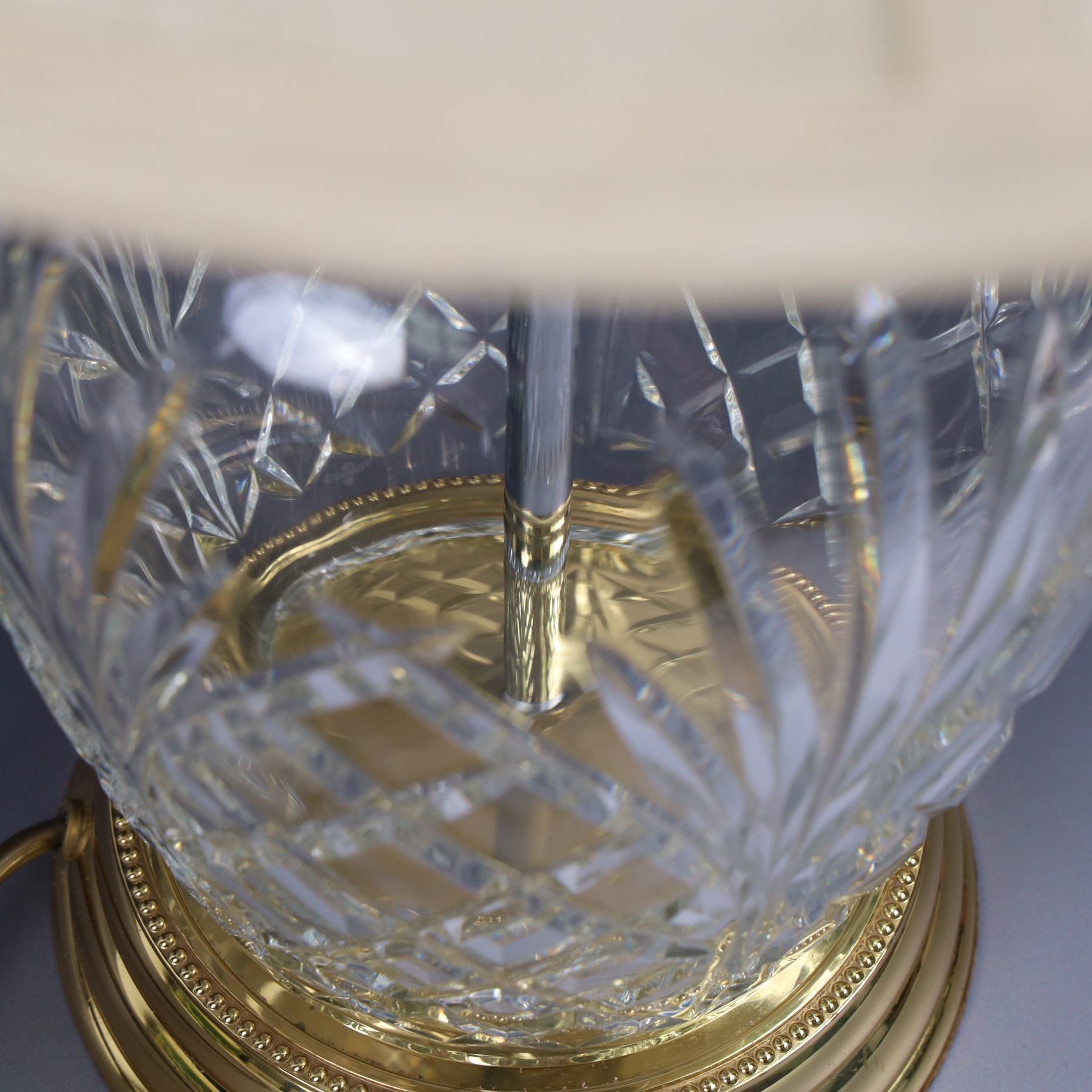 Waterford crystal table lamp, upon a circular gilt metal base, with shade H52cm