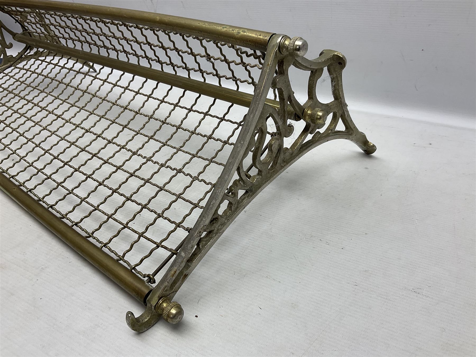 Railway interest - carriage compartment style wall mounting brass and mesh luggage rack, the ends cast with the initials NSWR (New South Wales Railroad) L77cm