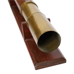 19th century single draw wooden telescope with brass mounts on a wooden stand, together with a mahogany and brass conical daylight enlarger and a B.I.T brass lens
