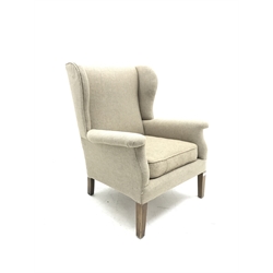 Vintage Parker Knoll wing back armchair, upholstered in natural fabric, W75cm, H97cm