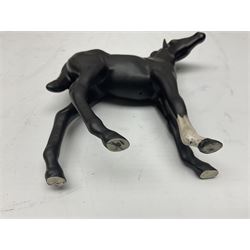 Four Beswick horses, including Exmoor no 1645, Black Beauty foal and two others 