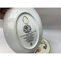 Royal Worcester Flower Fairies oval collectors plates, Goebel mustard pot, two Danbury Mint Fairy Tale bells, and pair of Hutschenreuther candlesticks decorated with scenes of Puss in Boots