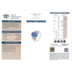 18ct white gold Ceylon sapphire and diamond dress ring, single oval cut sapphire of 4.65 carat, either side set with round brilliant cut and baguette cut diamonds and diamond set shoulders, stamped 750, total diamond weight 0.77 carat, with World Gemological Institute report