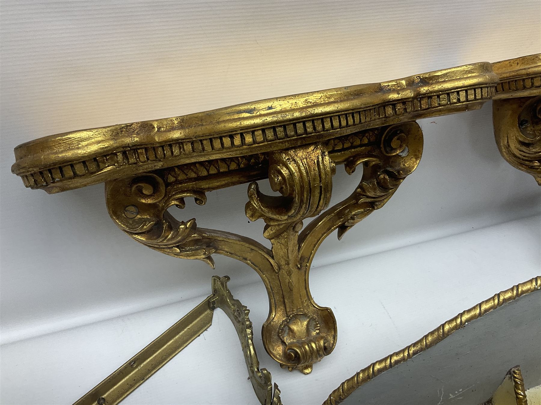 Five various giltwood and other hall brackets, one with marble top; and Viking ship table lamp
