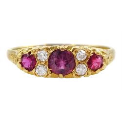 18ct gold three stone ruby and four stone round brilliant cut diamond ring, London 1975
