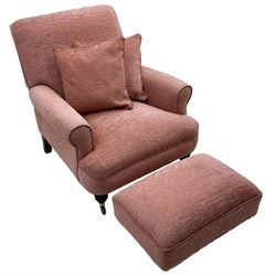 Victorian design armchair, rolled back and arms, upholstered in salmon pink fabric with two scatter cushions (W77cm, H82cm, D94cm); matching rectangular footstool (60cm x 41cm, H28cm)