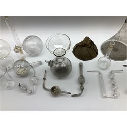 Collection of 19th century and later pharmaceutical laboratory glass, to include, volumetric flasks of various sizes, conical flask, stratus flask, etc (25) Provenance: discovered in the storeroom of a long established Hull pharmacist and opticians