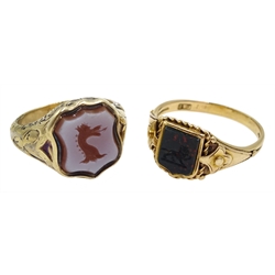 Victorian 15ct gold bloodstone lion intaglio, shield shaped signet ring and a 9ct gold agate dragon intaglio ring