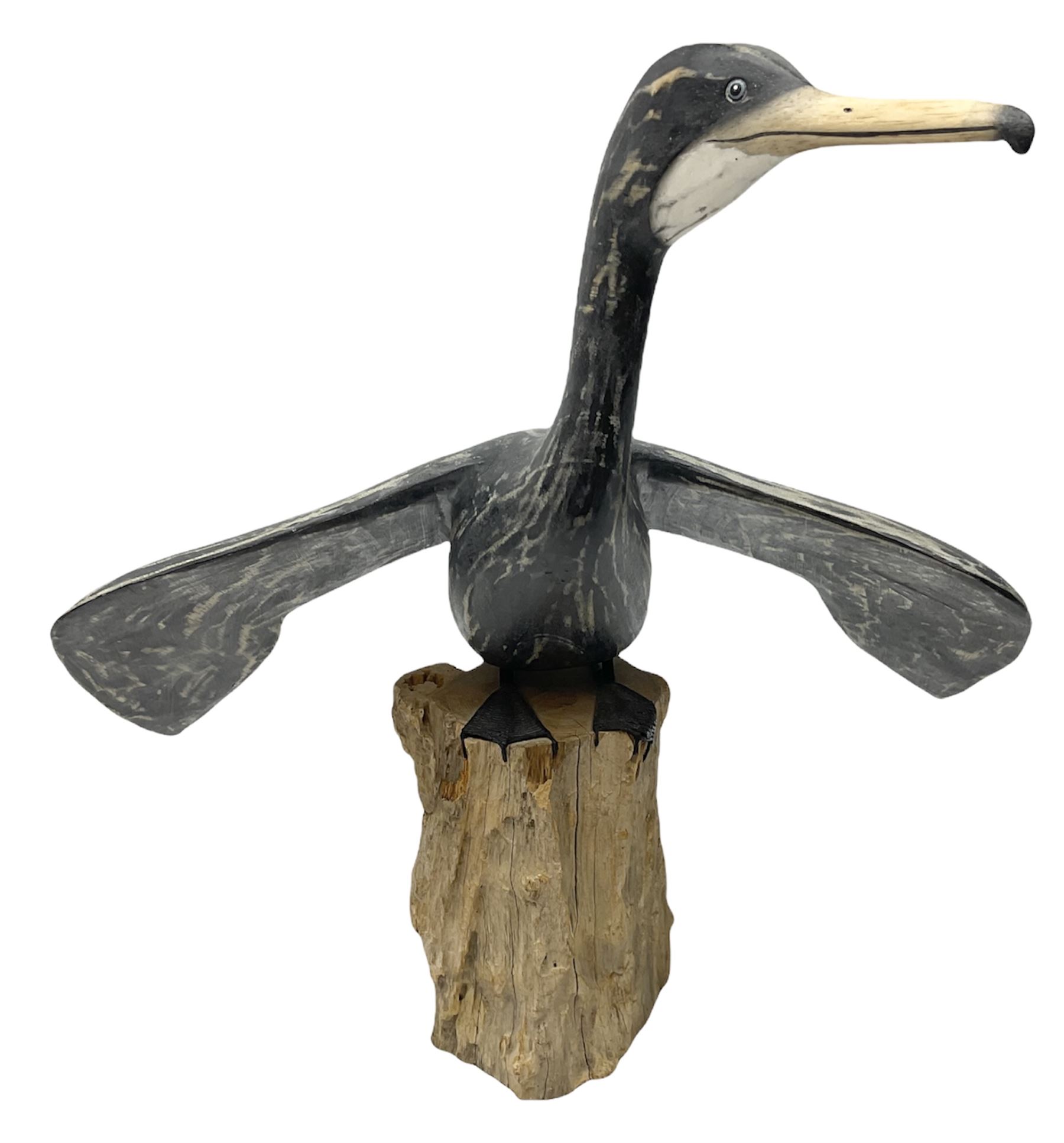 Wooden sculpture of Cormorant aquatic bird on a naturalistic wooden plinth, H46cm