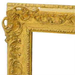 Large Louis XV style gilt framed mirror, the rectangular plate within a pierced and moulded surround decorated with foliate scrolls and flowerheads