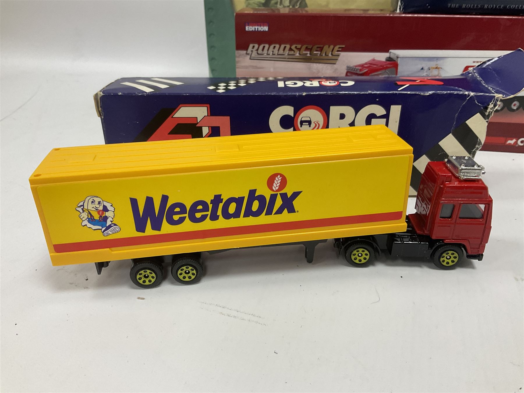 Eleven die-cast models from various makers to include Dinky 955 Fire Engine, missing ladder, boxed; Matchbox YY66 Her Majesty’s Gold State Coach; Corgi - CC18102 Scania R Series Toplone Fridge no.3474/3710; and further vehicles and aeroplanes to include Aviation Archive and Editions Atlas (11) 