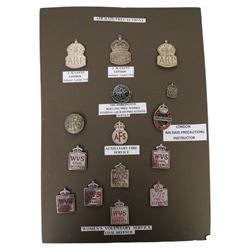Air Raid Precautions items, including four door plates, silver lapel bedges, Women's Voluntary Service, whistle, matchbox etc  