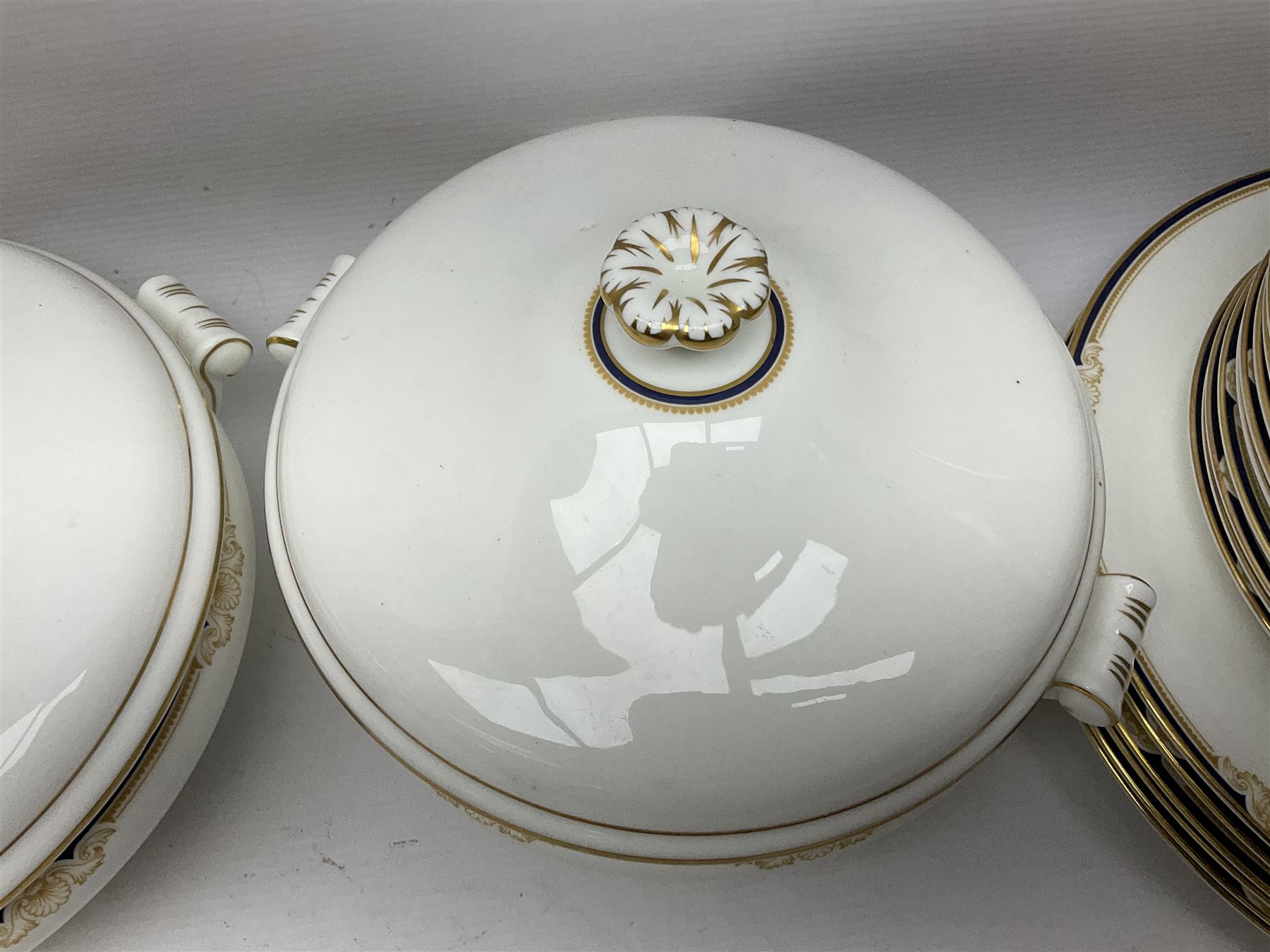 Wedgwood Cavendish pattern dinner service for twelve, comprising dinner plates, side plates, bowls, soup bowls, two tureens, saucer boat and sauce, together with matching part coffee service (82) 