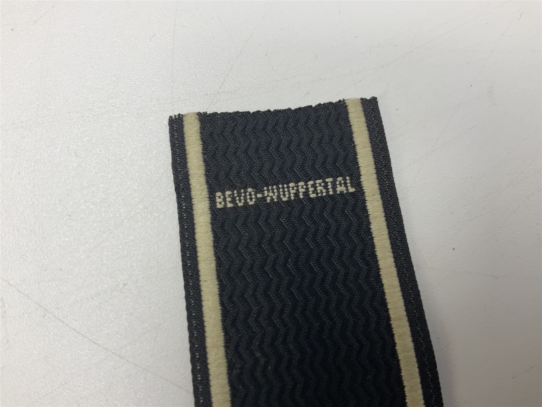 WW2 German Don Cossack epaulettes; and quantity of German insignia including SA Sports Badge for war wounded, Hitler Youth badge, Young Cossacks badge, Wound badge, Hitler Youth cuff title etc; in glass topped display box.