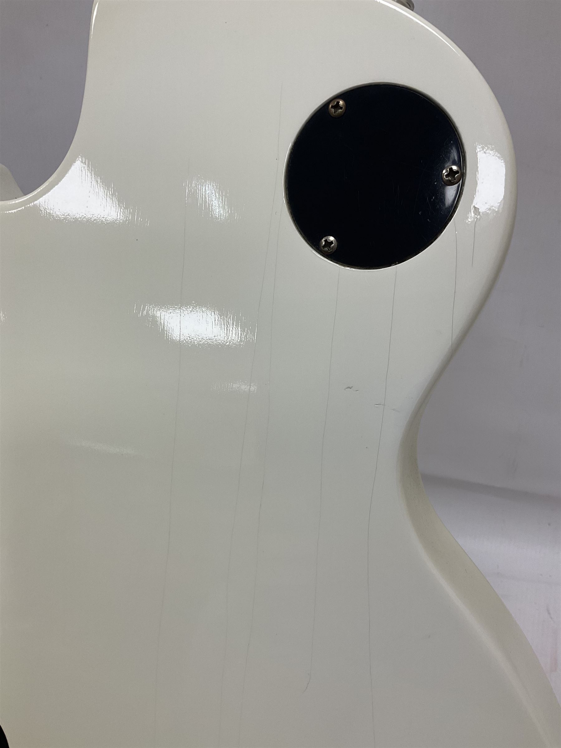 2010 Gibson Les Paul studio guitar, serial no101500537 in white finish with gold and pale green hardware, in Auden soft carry case, guitar L100cm