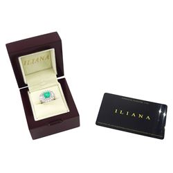18ct white gold Colombian emerald and diamond cluster ring by Iliana, single octagonal cut emerald of 1.65 carat, surrounded by two rows of round brilliant cut and tapered baguette cut diamonds, hallmarked