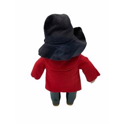 Gabrielle Designs Paddington Bear in a red felt jacket and black felt hat, c1972. Dunlop bottle green wellingtons and Darkest Peru label. H54cm