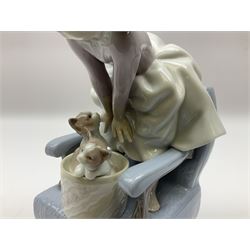 Two Lladro figures, comprising Ten and Growing no 7635 and Purrfect Friends no 6512, both with original boxes, largest example H24cm  