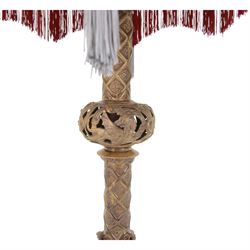 Gilt table lamp, three lion paw feet on a triangular base with column central support decorated with floral motifs, with octagonal shade, H85cm 